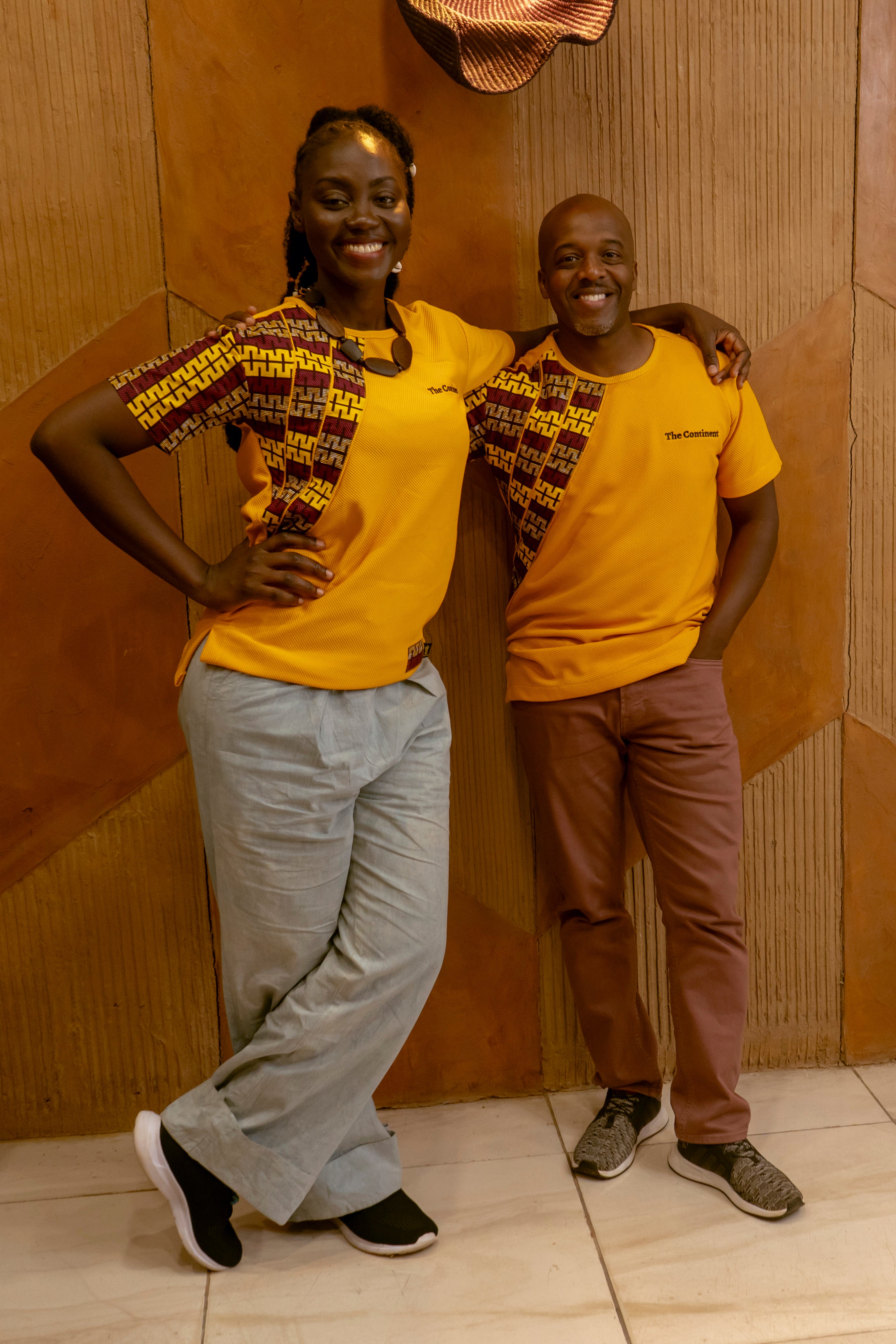 Tim Swain and ROA's Awura Abena  wearing matching Continent GIGIs shirts in the ROA flagship store.
